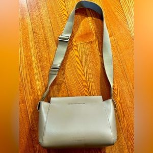 Everlane small cross body all leather bag in taupe color